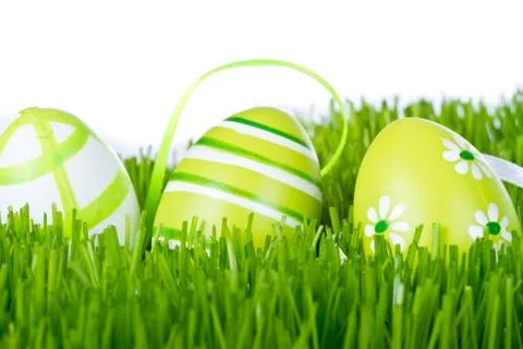 Easter eggs in grass Stock Photos