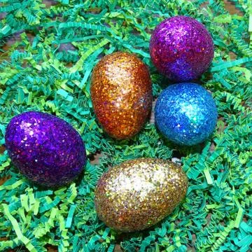 Easter eggs in grass. Stock Photos