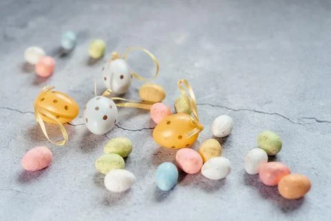 Easter eggs on gray cement background with copy space Stock Photos