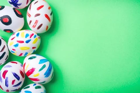 Easter eggs in a green background Stock Photos