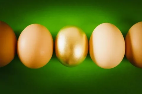 Easter eggs on a green background Stock Photos