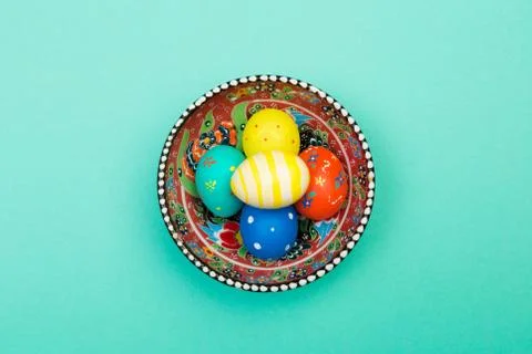 Easter eggs on green background, top view Stock Photos