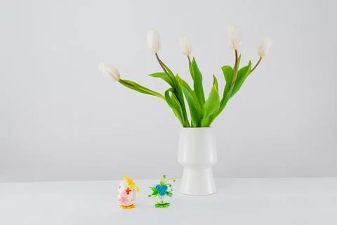Easter eggs in a green basket Stock Photos