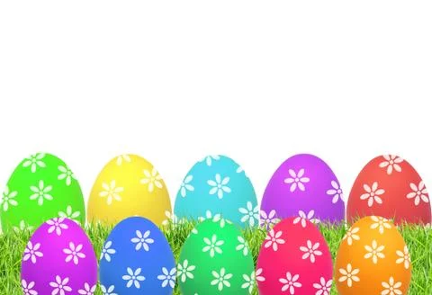 Easter eggs on green grass isolated on white Stock-Fotos