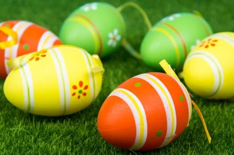 Easter eggs on green grass. Stock Photos