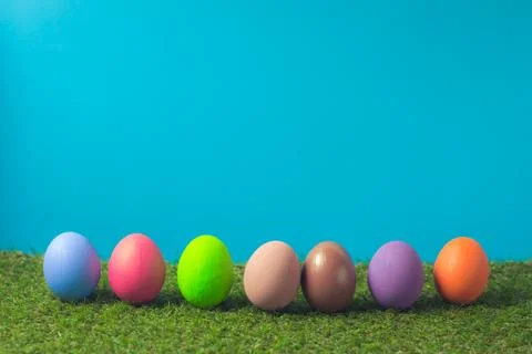 Easter eggs on the green grass. Stock Photos