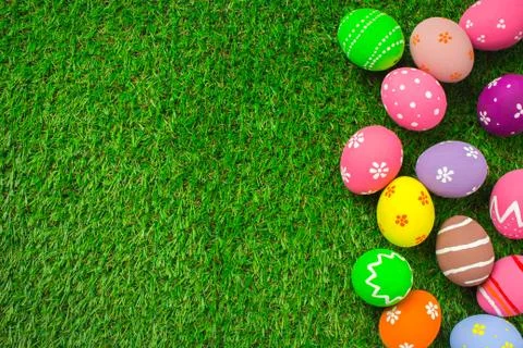 Easter eggs on the green grass. Stock Photos