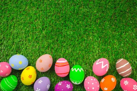 Easter eggs on the green grass. Stock Photos