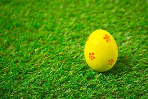 Easter eggs on the green grass. Stock Photos