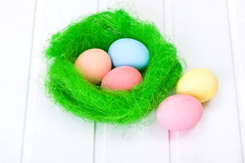 Easter eggs in green nest 스톡 사진