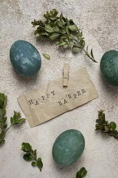 Easter eggs, green, staple text, boxwood, retro, top view Stock Photos
