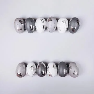 Easter eggs on grey Stock Photos