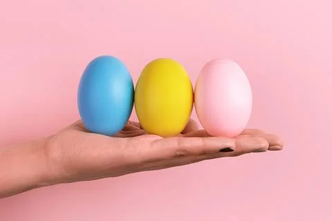 Easter eggs on hand Stock Photos