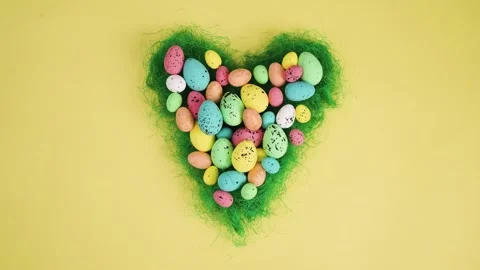 Easter eggs in heart nest stop motion animation Stock Footage 300364187