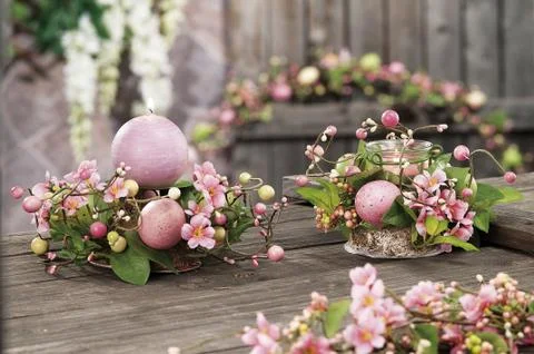 Easter eggs hidden in natural straw nest Stock Photos