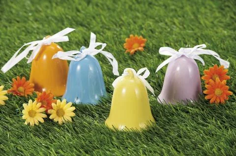 Easter eggs hidden in natural straw nest Stock Photos