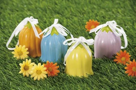 Easter eggs hidden in natural straw nest Stock Photos