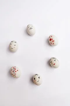 Easter eggs lie in circle on white background Foto stock