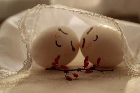 Easter eggs lie under a white napkin 写真素材