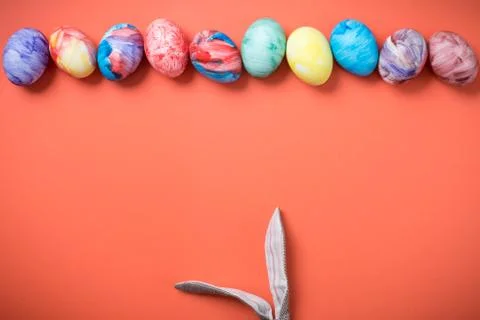 Easter eggs on a Living Coral background Stock Photos