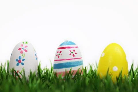 Easter eggs on meadow Stock Photos