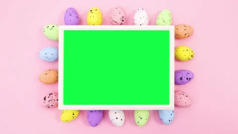 Easter eggs move around frame with green screen. Stop motion Stock Footage 148779023