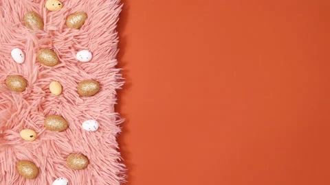 Easter eggs move on fur on red background. Stop motion Stock Footage 150281945