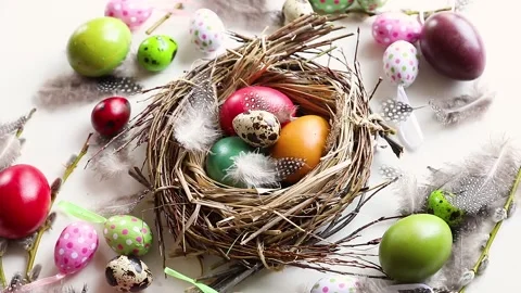 Easter eggs in nest. Easter holiday concept. View from above Stock Footage 148251787