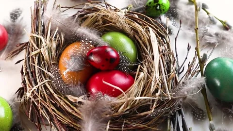 Easter eggs in nest. Easter holiday concept. View from above Stock Footage 148251789