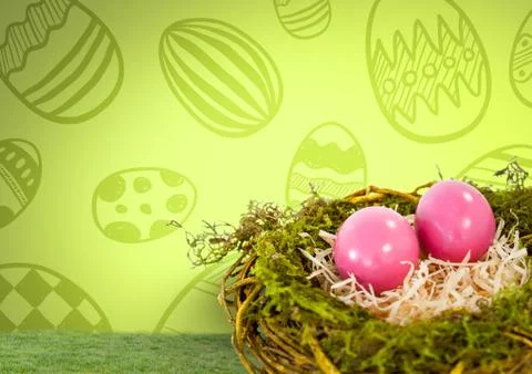 Easter eggs in nest in front of pattern Foto stock
