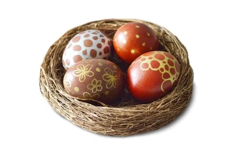 Easter eggs in nest isolated on white background Foto stock