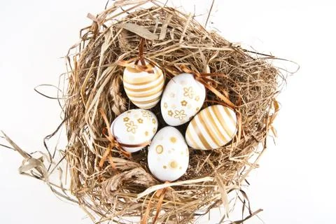 Easter eggs in nest Stock Photos