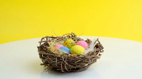 Easter eggs in nest Stock Photos