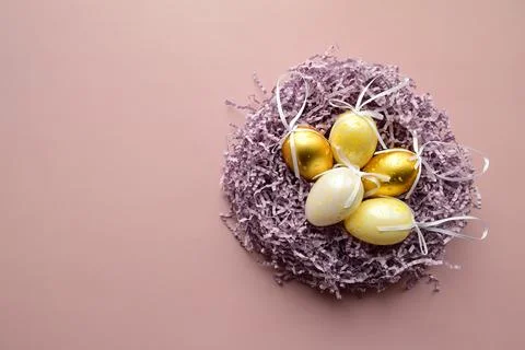 Easter eggs in nest Stock Photos
