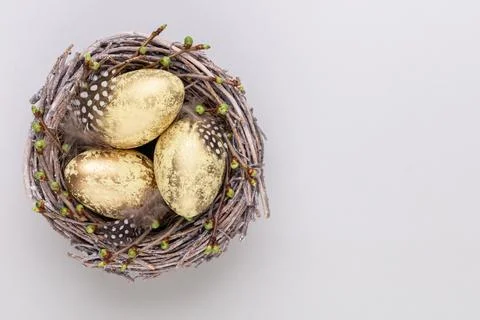 Easter eggs in the nest. Spring greeting card. Stock Photos