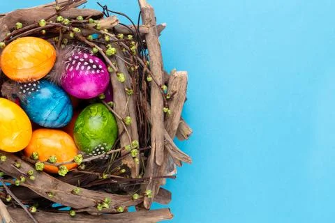 Easter eggs in the nest. Spring greeting card. Stock Photos