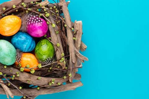 Easter eggs in the nest. Spring greeting card. Stock Photos