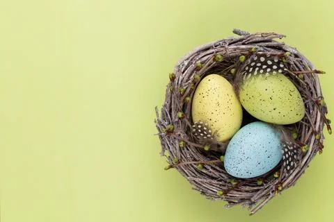 Easter eggs in the nest. Spring greeting card. Stock Photos