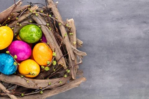Easter eggs in the nest. Spring greeting card. Stock Photos