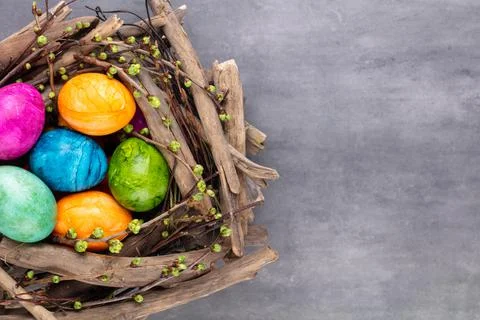 Easter eggs in the nest. Spring greeting card. Stock Photos