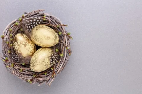 Easter eggs in the nest. Spring greeting card. Stock Photos