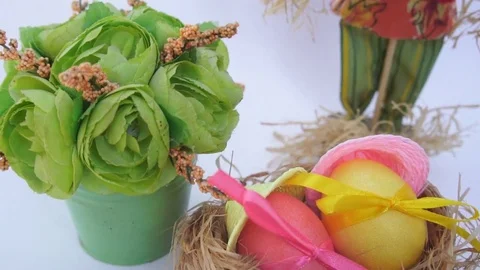 Easter Eggs in a Nest, a Straw Man Stock Footage 73504729