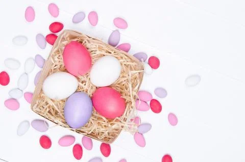 Easter eggs in the nest on white background Stock Photos
