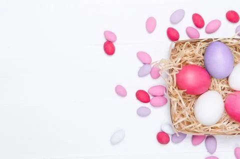 Easter eggs in the nest on white background Stock Photos