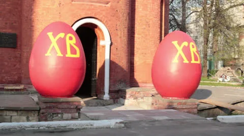 Easter eggs next to church Stock Footage 23298810