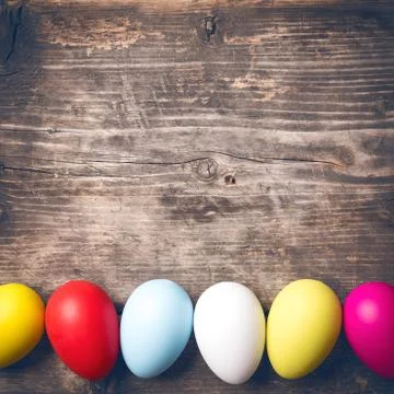 Easter Eggs on old boards. Stock Photos
