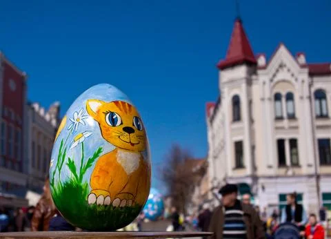 Easter eggs with a painted cat on a background Stock Photos