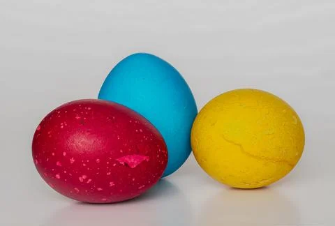Easter eggs painted in different colors with unusual patterns on a white ba.. Stock Photos