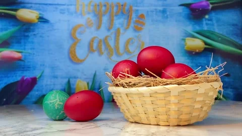 Easter eggs painted in red color on a wooden background. Happy Easter. Stock Footage 217486240