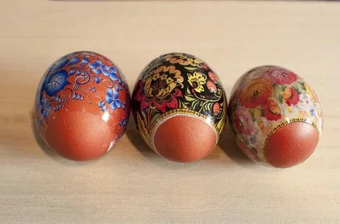 Easter eggs painted red in thermal film. Stock Photos